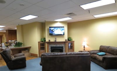 Common area with couches and a TV