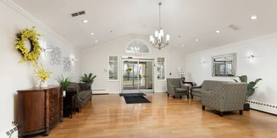 Bright interior lobby with seating and plants
