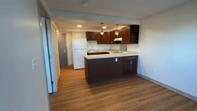 Kitchen area of a resident apartment in a senior living facility