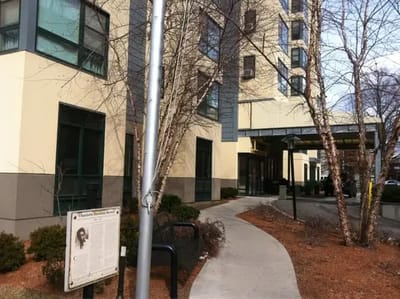 Exterior view of the building entrance and pathway