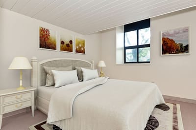 Cozy bedroom setup with decorative art