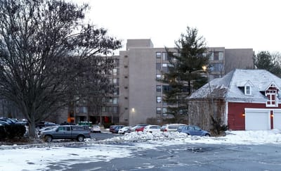 View of the facility's exterior with surrounding parking