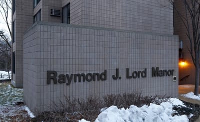 Exterior view of Raymond J. Lord Manor sign