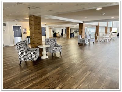 Bright common area with seating and dining spaces