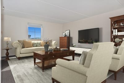 Bright and welcoming common area with furniture