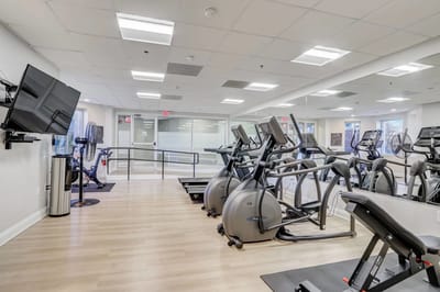 Well-equipped fitness center with exercise machines