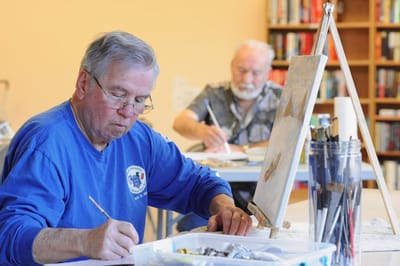 Residents participating in an art class