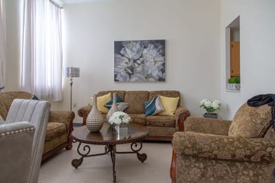 Comfortable seating area in the facility's common room