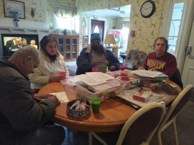 Residents engaging in a group activity in a common area