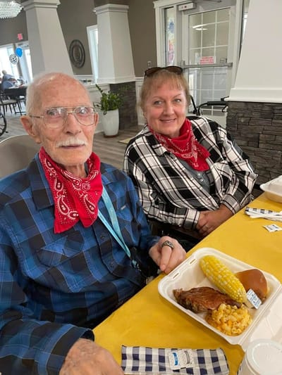 Residents enjoying a meal in the dining area