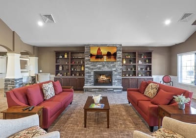 Cozy common area with seating and fireplace