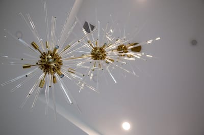 Stylish modern chandelier in a bright interior