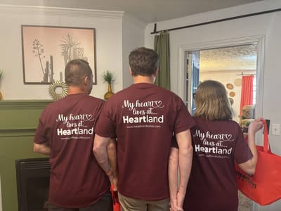 Residents in matching shirts in a common area