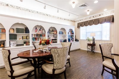 Cozy common area with bookshelves and seating