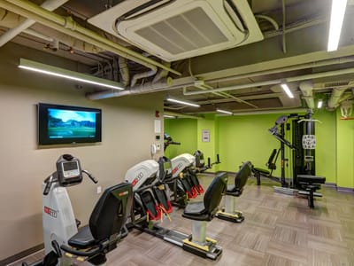 Interior view of a gym area with exercise machines