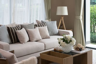 Cozy common area with couch and flowers