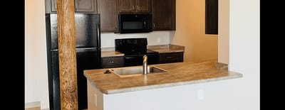 Modern kitchen layout in an assisted living apartment