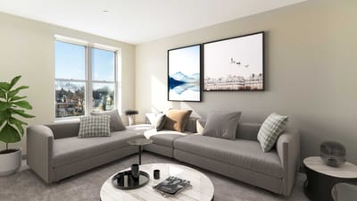 Modern furnished lounge area with natural light