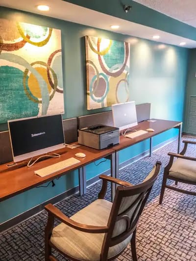 Interior view of a computer area with artwork