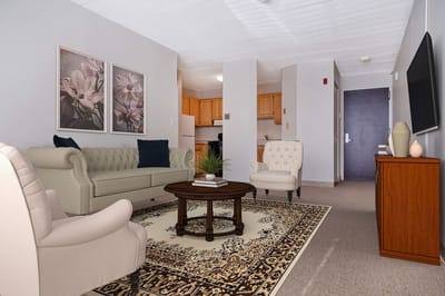 Well-furnished living room in a senior care facility