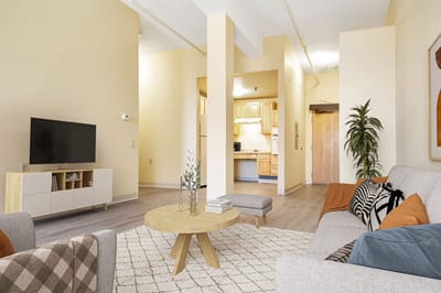 Bright and spacious living room area with modern furnishings