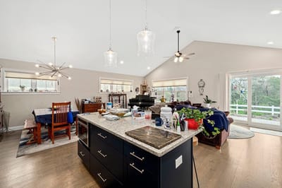 Bright common area with dining and seating spaces