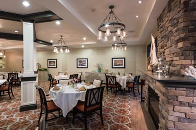 Elegant dining area with tables set for meals