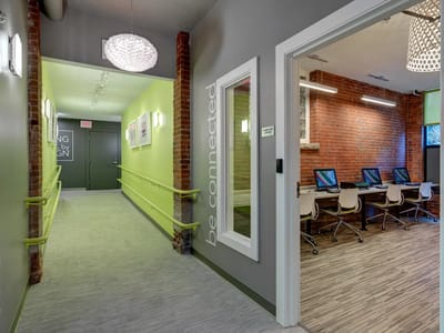 Interior corridor leading to a common area