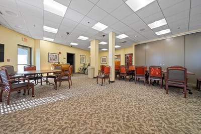 Bright common area with tables and chairs