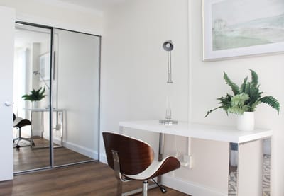 Interior view of a modern resident room with desk