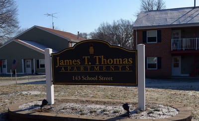 Exterior sign for James T. Thomas Apartments