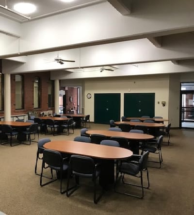 Interior common area with tables and chairs