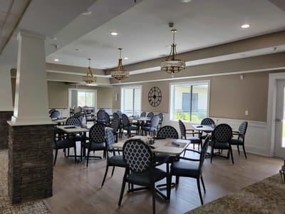 Bright dining room with tables and chairs