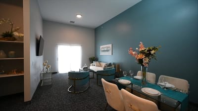 Interior view of a modern common area with dining table