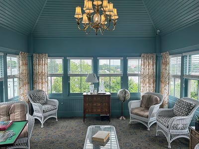 Bright, inviting common area with seating and natural light