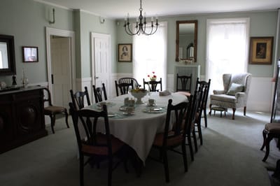 Dining room set with a large table and chairs