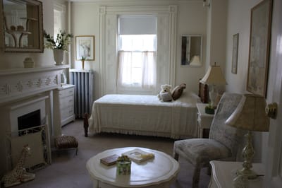 Cozy resident room with light decor and furnishings