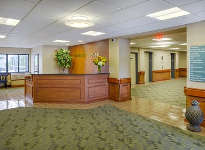 Reception area with floral arrangements and seating