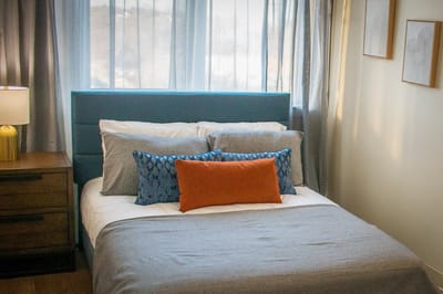 Cozy guest room with a neatly made bed