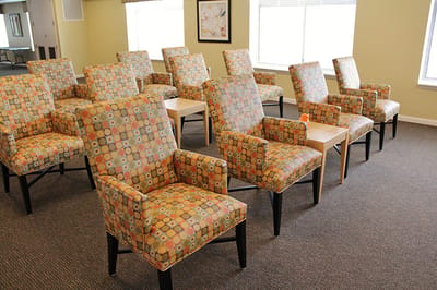 Interior seating area with patterned chairs
