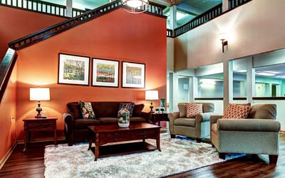 Interior view of a cozy common area with seating