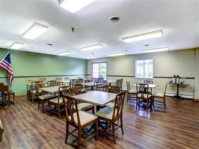 Bright dining room with tables and chairs