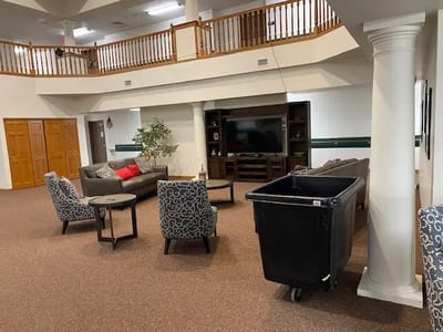 Common area with seating and television