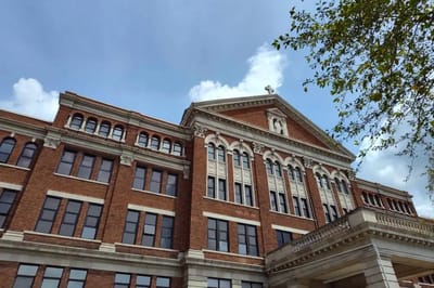 Exterior view of the Academy Manor building