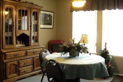 Cozy common area with dining table and decorations
