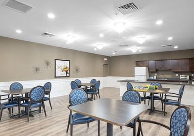 Bright dining room with tables and chairs