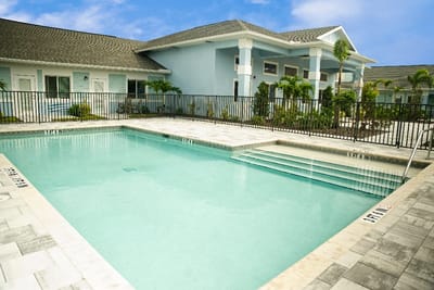 Swimming pool area at Hampton Manor with landscaping