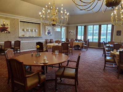 Dining room with tables set for meals