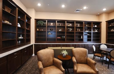Common area with bookshelves and seating