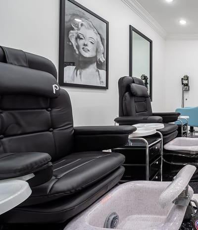 Interior view of a spa area with massage chairs